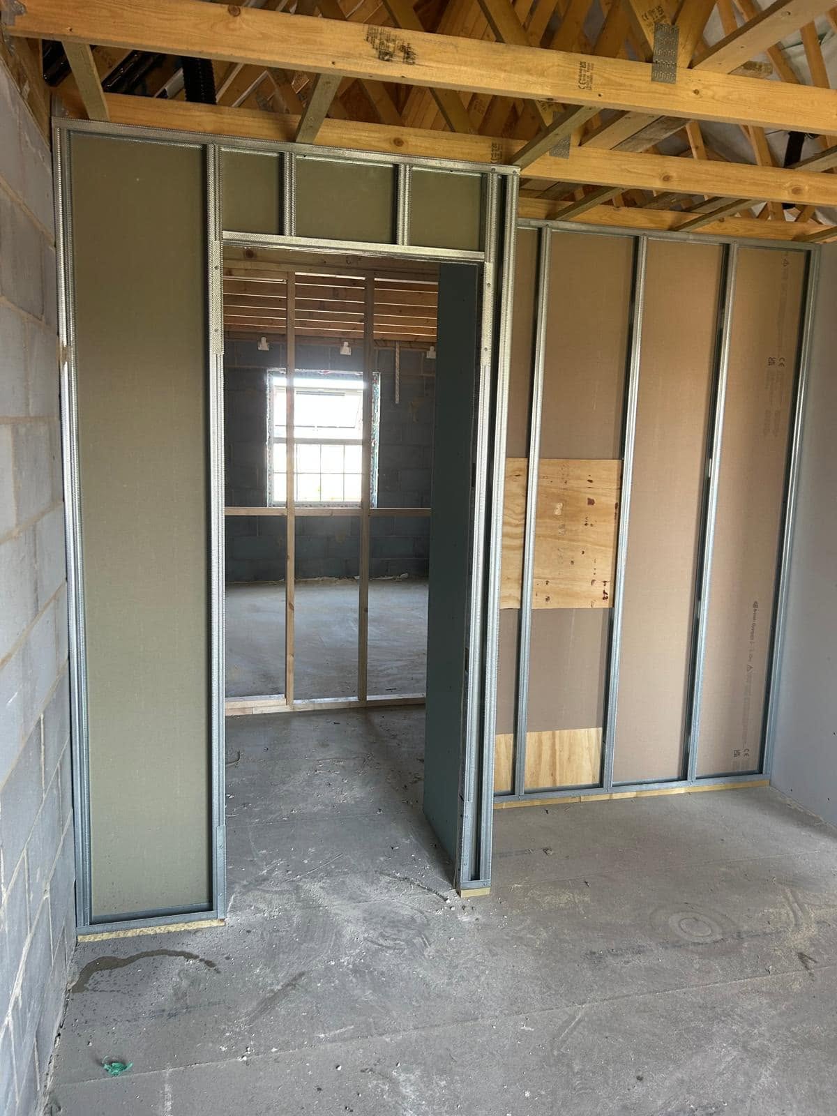Stud wall framework ready for boarding in Essex