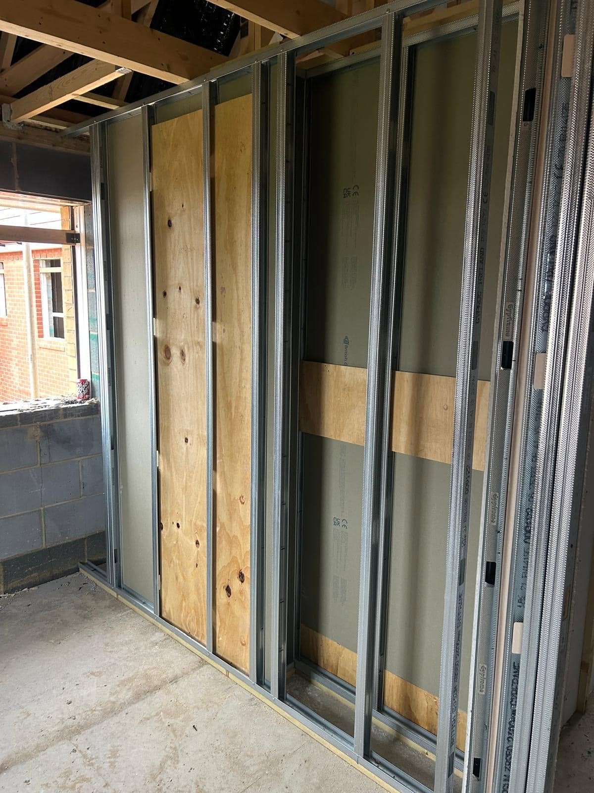 Plasterboarded partition wall in a commercial property in Basildon